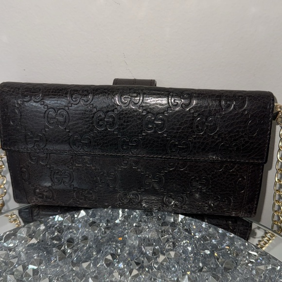 Gucci Chocolate Brown Long Wallet has its crossbody chain attached. - Picture 2 of 10